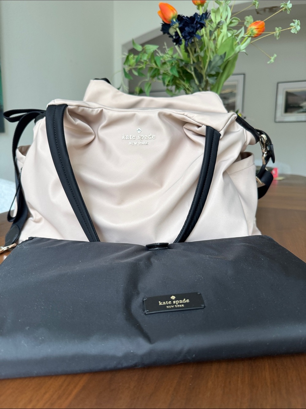 kate spade Nylon infant Bag in pale dusty rose; brown trim and handles; pad EUC